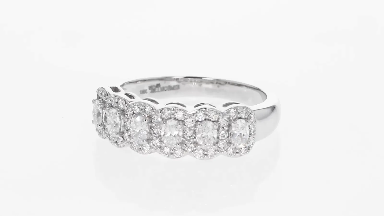 The Lab Grown Oval Diamond Halo Half Band Ring